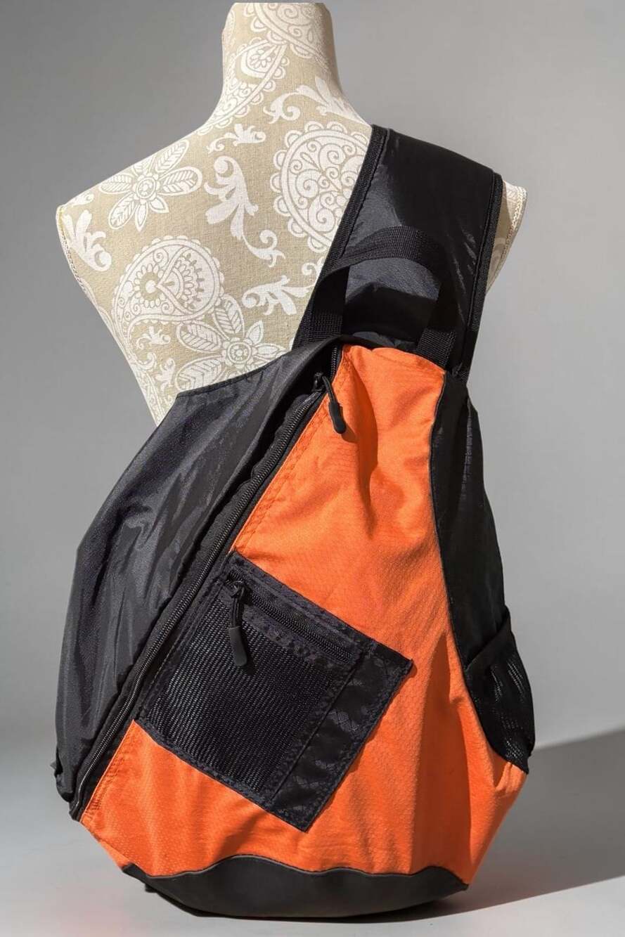 Piper Gear Black and Safety Orange Sling Bag Crossbody Backpack